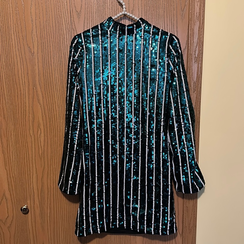 A classy back out sequin dress